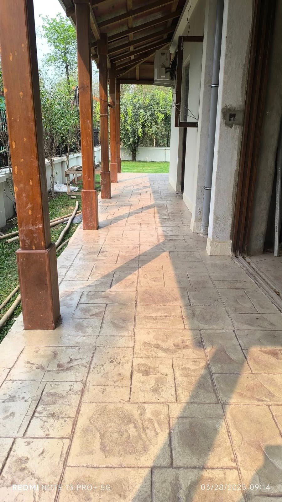 Stamped concrete covered walkway